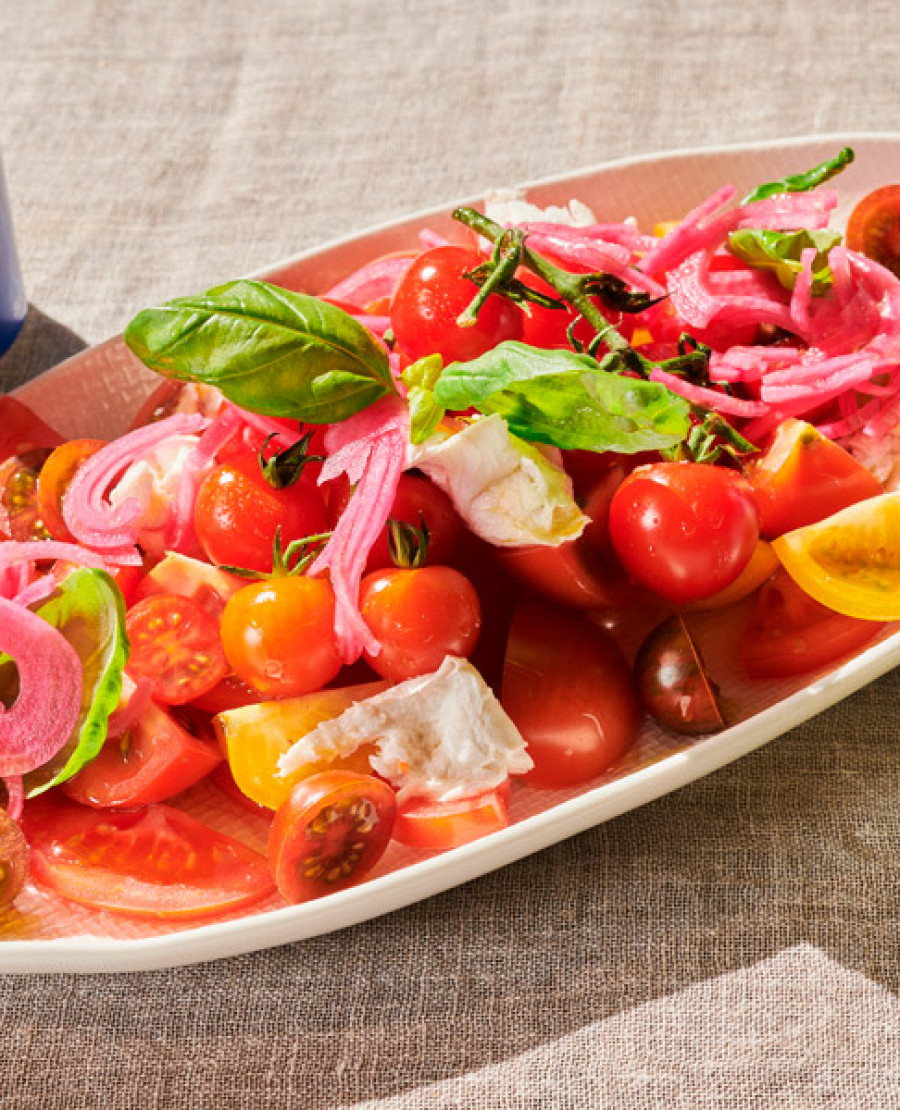 HEIRLOOM TOMATO SALAD WITH BUFFALO MOZZARELLA CASHEW PESTO Toast