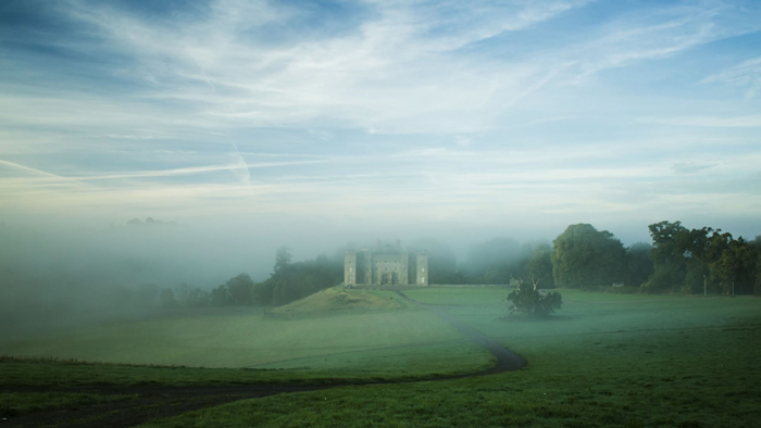 a misty Slane Castle in Ireland home to Slane Irish Whiskey