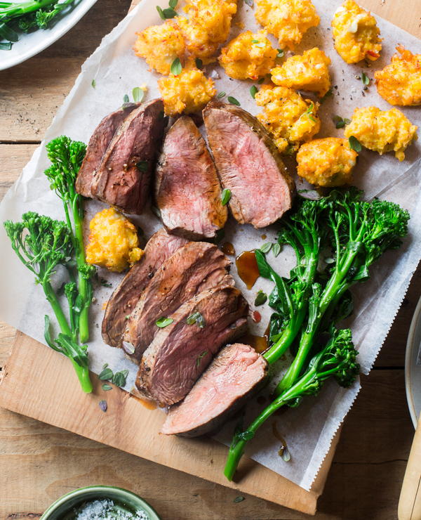 Lamb Rumps with red wine reduction and corn and feta fritters Toast